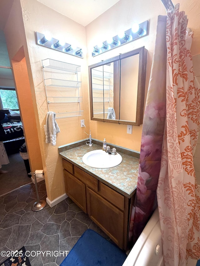 4100 W Peterson Bay Ct, Wasilla, AK 99623 - full bathroom featuring vanity and shower / bath combo