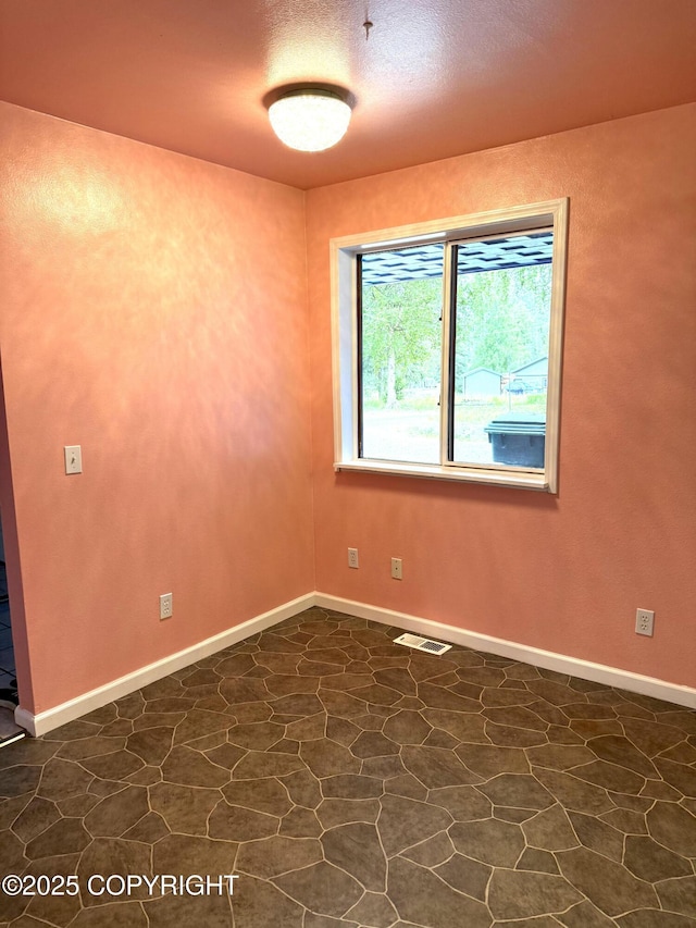 4100 W Peterson Bay Ct, Wasilla, AK 99623 - unfurnished room featuring baseboards