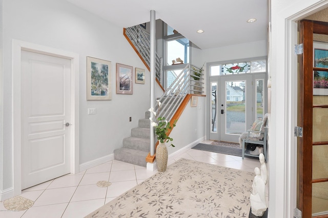 1240 Chinook Dr, Kenai, AK 99611 - foyer entrance with tile patterned flooring, stairs, and recessed lighting