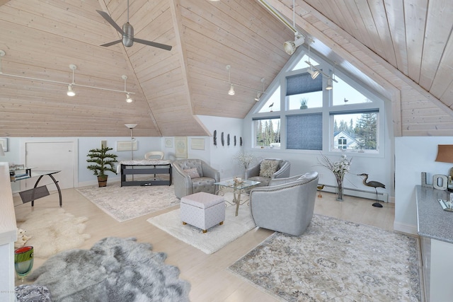 1240 Chinook Dr, Kenai, AK 99611 - living area with wooden ceiling, vaulted ceiling, ceiling fan, wood finished floors, and a baseboard radiator