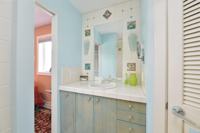 1240 Chinook Dr, Kenai, AK 99611 - bathroom with vanity and backsplash