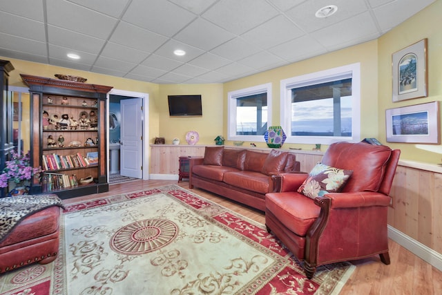 1240 Chinook Dr, Kenai, AK 99611 - living room with wood finished floors, a drop ceiling, wainscoting, and recessed lighting