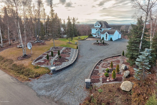 1240 Chinook Dr, Kenai, AK 99611 - view of green lawn with driveway and a garage