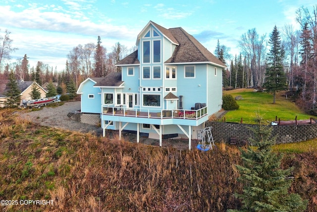 1240 Chinook Dr, Kenai, AK 99611 - back of house featuring a wooden deck and a shingled roof