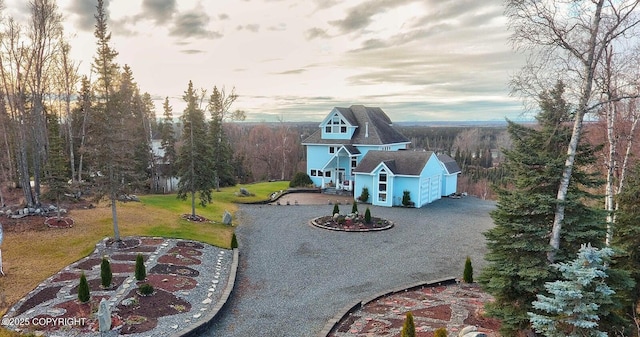 1240 Chinook Dr, Kenai, AK 99611 - exterior space with driveway and a garage