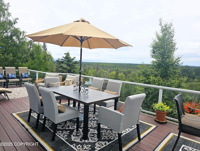 1240 Chinook Dr, Kenai, AK 99611 - deck featuring outdoor dining area and a forest view