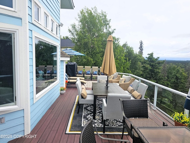 1240 Chinook Dr, Kenai, AK 99611 - wooden deck featuring outdoor dining space