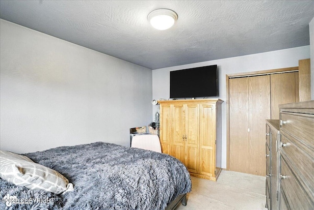 6260 Newt Dr, Anchorage, AK 99507 - bedroom featuring light colored carpet and a closet
