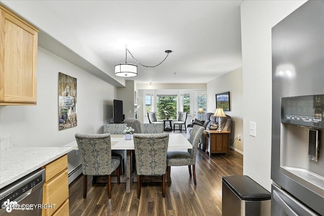 11351 Discovery View Dr # 106, Anchorage, AK 99515 - dining area with dark wood-style floors and baseboard heating