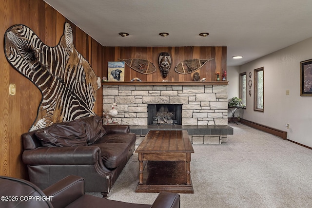 11851 Nebesna Dr, Anchorage, AK 99507 - carpeted living area with a baseboard radiator, a stone fireplace, and wood walls