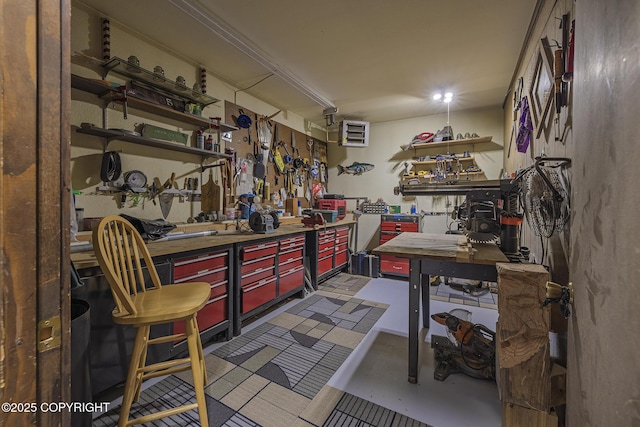 11851 Nebesna Dr, Anchorage, AK 99507 - misc room featuring a workshop area