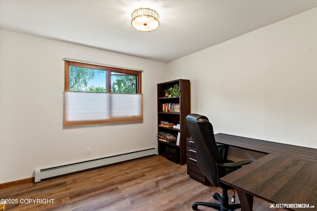 6922 Cutty Sark St, Anchorage, AK 99502 - office space featuring a baseboard radiator and wood finished floors