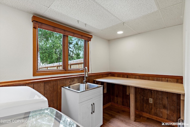 6922 Cutty Sark St, Anchorage, AK 99502 - washroom featuring a wainscoted wall, wood finished floors, wooden walls, and recessed lighting