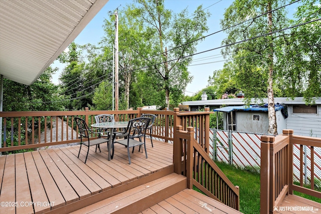 6922 Cutty Sark St, Anchorage, AK 99502 - wooden deck with outdoor dining space