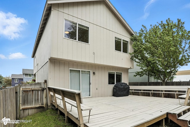 9380 Sea Parrot Cir, Anchorage, AK 99515 - rear view of house featuring a wooden deck