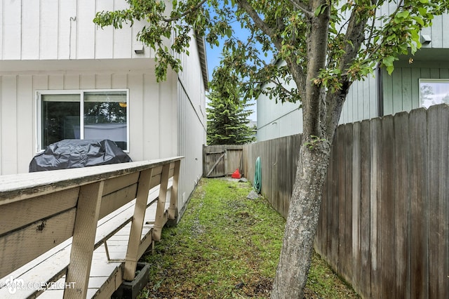 9380 Sea Parrot Cir, Anchorage, AK 99515 - view of side of home with a fenced backyard
