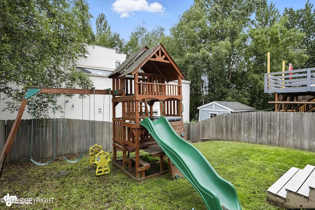 9380 Sea Parrot Cir, Anchorage, AK 99515 - view of jungle gym with a fenced backyard