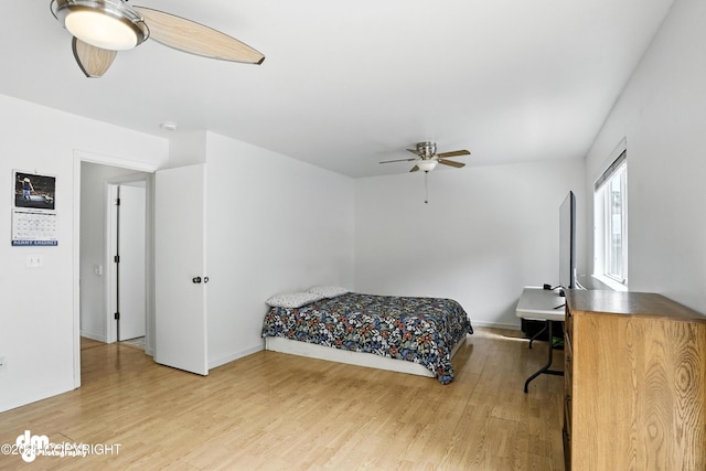 9380 Sea Parrot Cir, Anchorage, AK 99515 - bedroom with light wood-style flooring and a ceiling fan