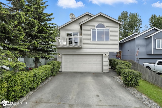 9380 Sea Parrot Cir, Anchorage, AK 99515 - view of front of property featuring a garage, driveway, and a balcony