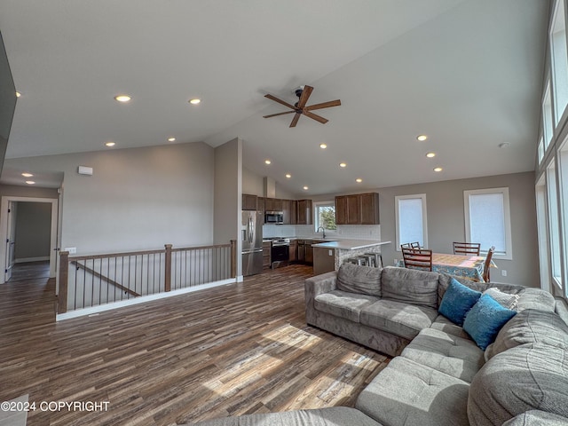 3715 Tajen Ln, Homer, AK 99603 - living area with dark wood finished floors, recessed lighting, high vaulted ceiling, and a ceiling fan