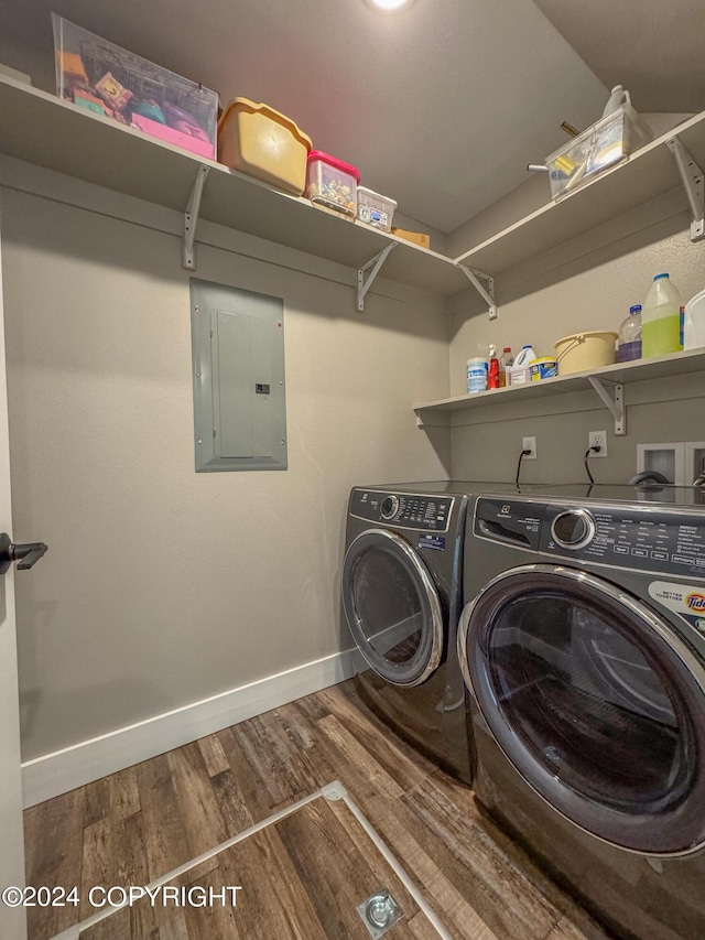 3715 Tajen Ln, Homer, AK 99603 - laundry area with electric panel, washing machine and dryer, and wood finished floors