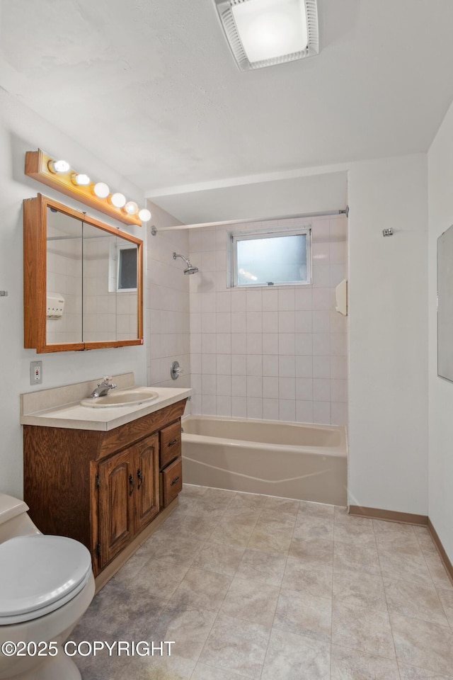 40800 Lopez Ave, Soldotna, AK 99669 - full bath with shower / bathtub combination, vanity, and tile patterned flooring