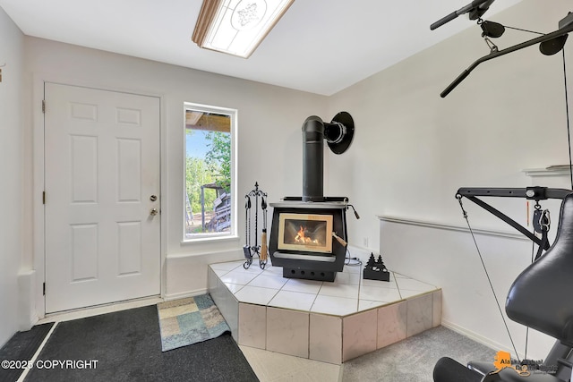 11929 W Wasey Cir, Houston, AK 99623 - living room with a wood stove and carpet flooring