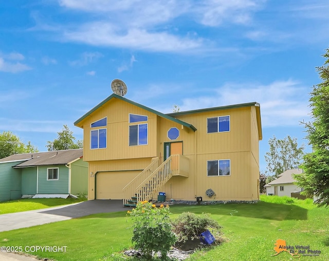 1710 Rierie Dr, Anchorage, AK 99507 - view of front of house with asphalt driveway, an attached garage, and a front lawn