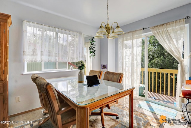 1710 Rierie Dr, Anchorage, AK 99507 - dining space with a chandelier and baseboards