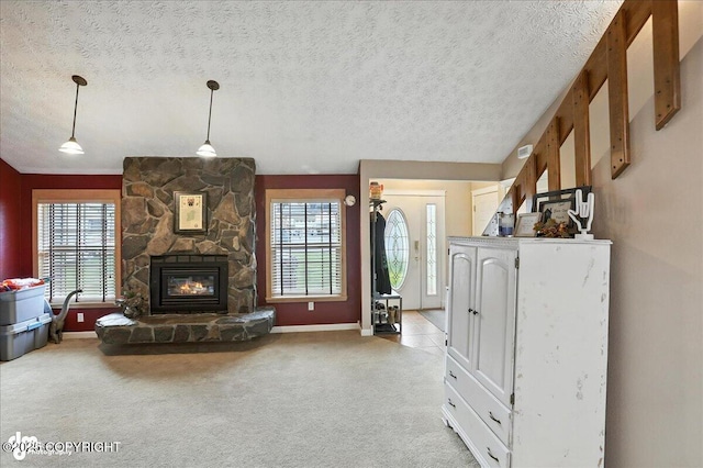 1801 Rebel Ridge Dr, Anchorage, AK 99504 - living room with a textured ceiling, light colored carpet, and a stone fireplace