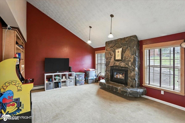 1801 Rebel Ridge Dr, Anchorage, AK 99504 - living area featuring vaulted ceiling, carpet floors, a stone fireplace, a textured ceiling, and baseboard heating
