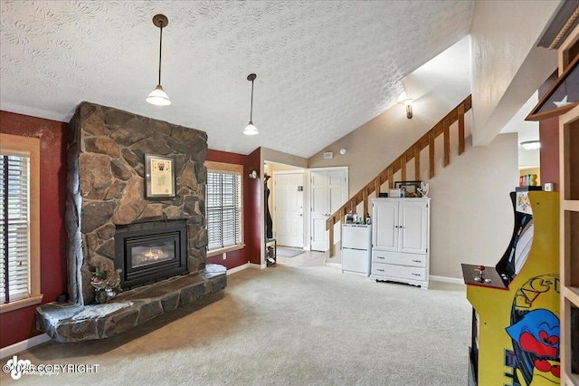 1801 Rebel Ridge Dr, Anchorage, AK 99504 - playroom with carpet flooring, a textured ceiling, and a stone fireplace