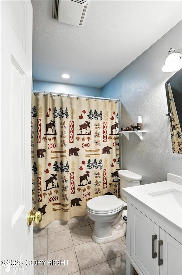 1801 Rebel Ridge Dr, Anchorage, AK 99504 - bathroom featuring vanity, tile patterned flooring, a textured ceiling, a shower with shower curtain, and a textured wall