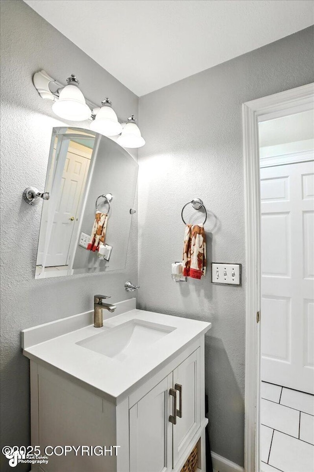 1801 Rebel Ridge Dr, Anchorage, AK 99504 - bathroom with vanity and a textured wall