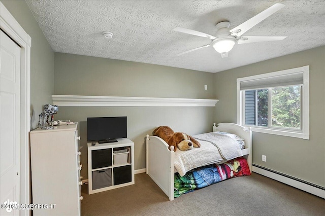 1801 Rebel Ridge Dr, Anchorage, AK 99504 - carpeted bedroom featuring a baseboard radiator, a textured ceiling, and a ceiling fan