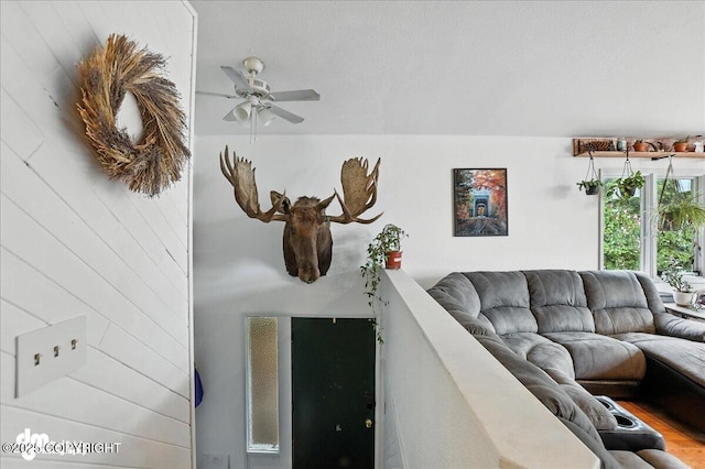 10845 Anvik Cir, Eagle River, AK 99577 - living room with a ceiling fan and wood finished floors