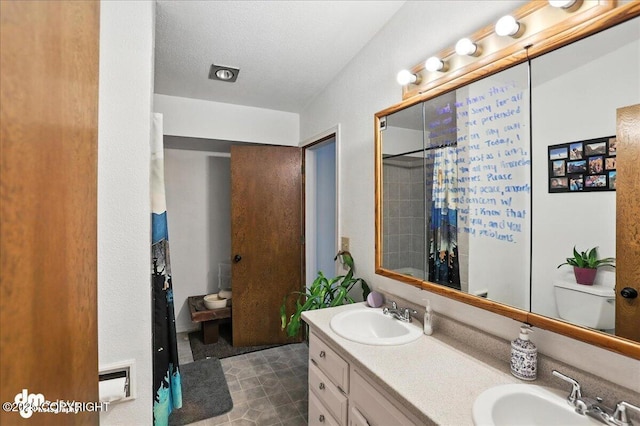 10845 Anvik Cir, Eagle River, AK 99577 - bathroom with double vanity and a shower with curtain