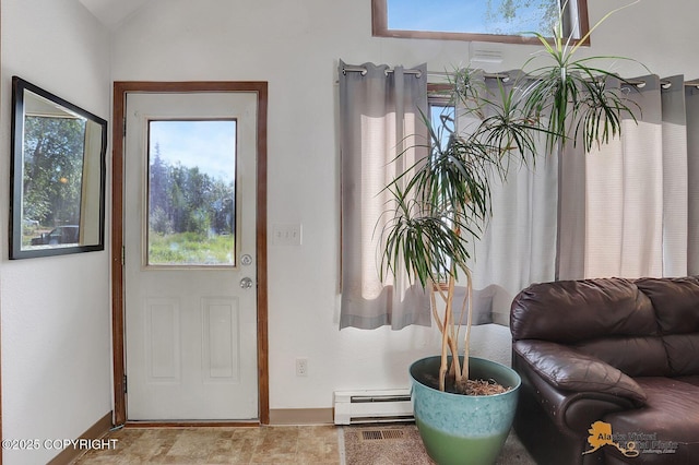 14854 W Fox, Big Lake, AK 99623 - foyer entrance featuring a baseboard heating unit and baseboards