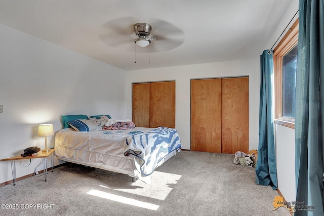 14854 W Fox, Big Lake, AK 99623 - bedroom featuring carpet flooring, multiple closets, and a ceiling fan