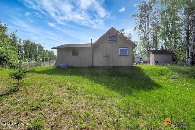 14854 W Fox, Big Lake, AK 99623 - back of house with an outbuilding