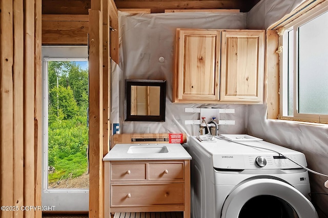 69222 S Parks Hwy, Willow, AK 99688 - laundry room featuring cabinet space and washer and clothes dryer