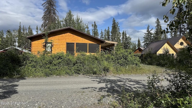 34704 Dolly Way, Sterling, AK 99672 - view of property exterior featuring log veneer siding