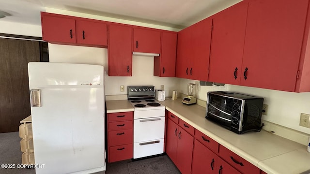 34704 Dolly Way, Sterling, AK 99672 - kitchen with red cabinets and white appliances