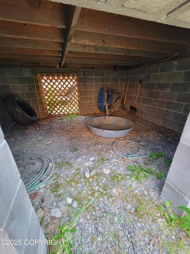 34655 Sockeye Ln, Sterling, AK 99672 - inside crawl space featuring concrete block wall