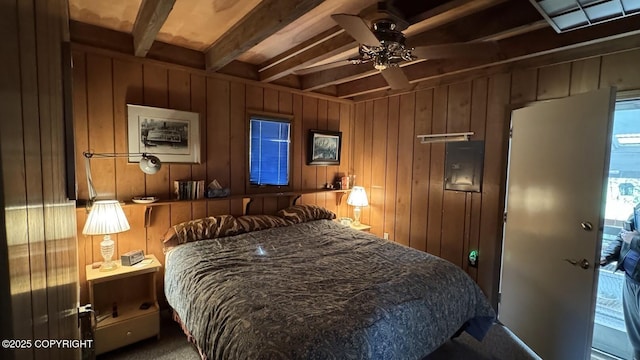 34655 Sockeye Ln, Sterling, AK 99672 - bedroom with beam ceiling, wood walls, and a ceiling fan