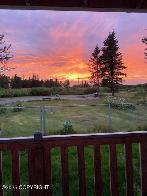 12210 Sterling Hwy, Ninilchik, AK 99639 - yard at dusk featuring a view of rural / pastoral area and a water view