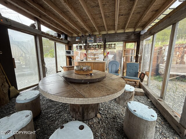 25646 Hawks Beach Rem SW, Anchor Point, AK 99556 - sunroom / solarium featuring plenty of natural light and outdoor dining space