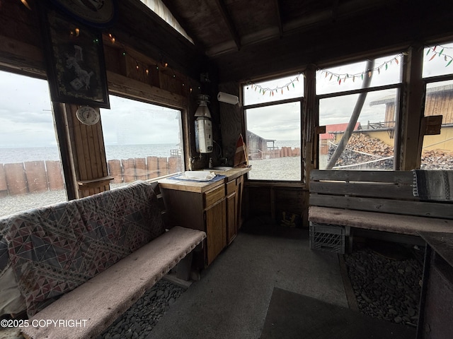 25646 Hawks Beach Rem SW, Anchor Point, AK 99556 - sunroom / solarium with a water view and carpet flooring