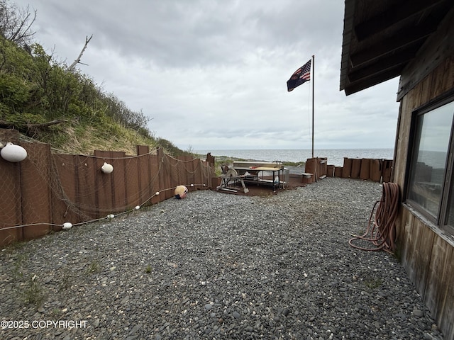 25646 Hawks Beach Rem SW, Anchor Point, AK 99556 - fenced backyard featuring a water view