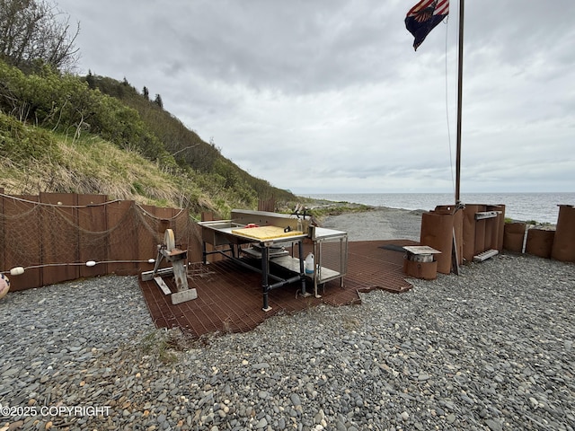 25646 Hawks Beach Rem SW, Anchor Point, AK 99556 - view of yard with a deck with water view